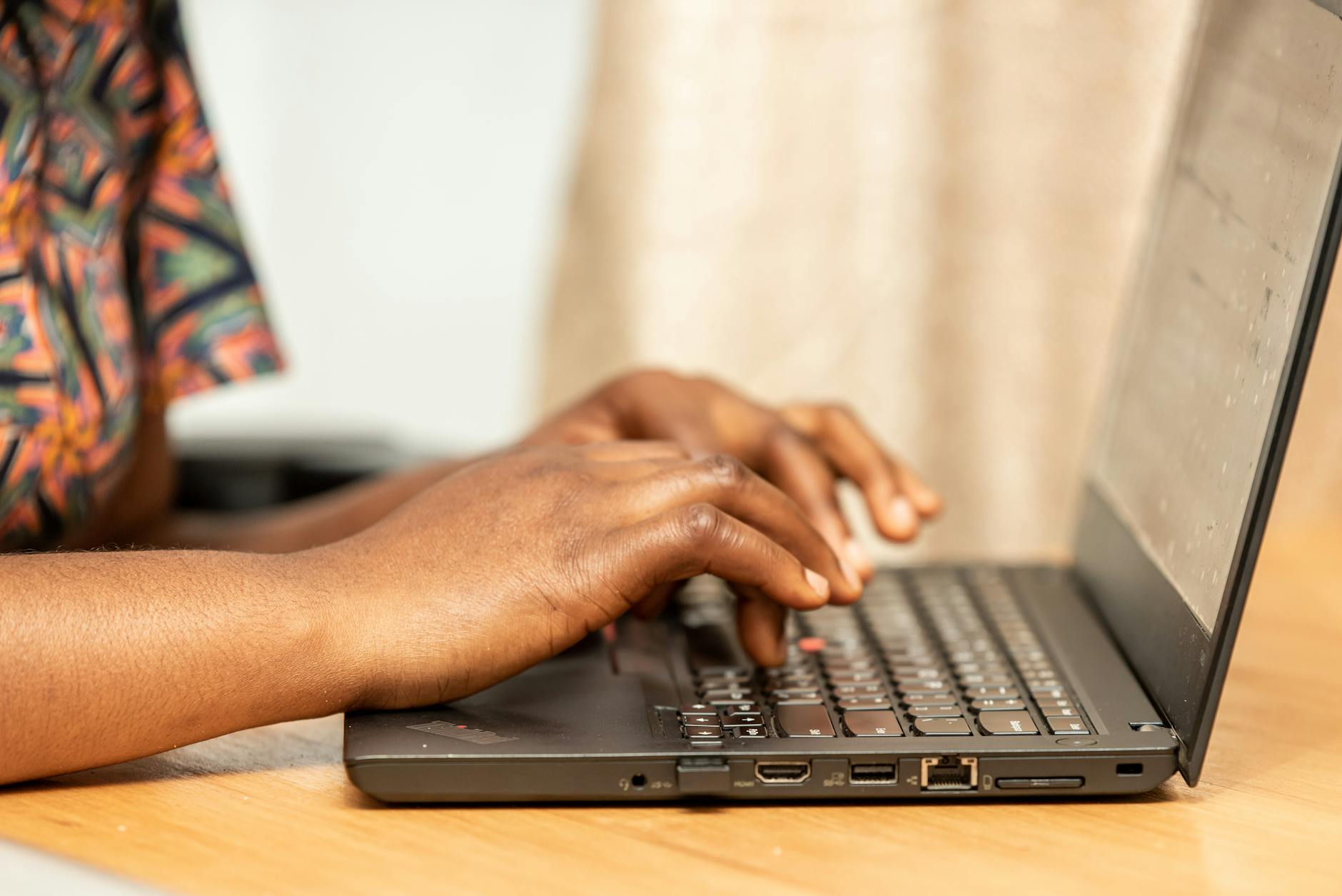 close up photo of person using laptop