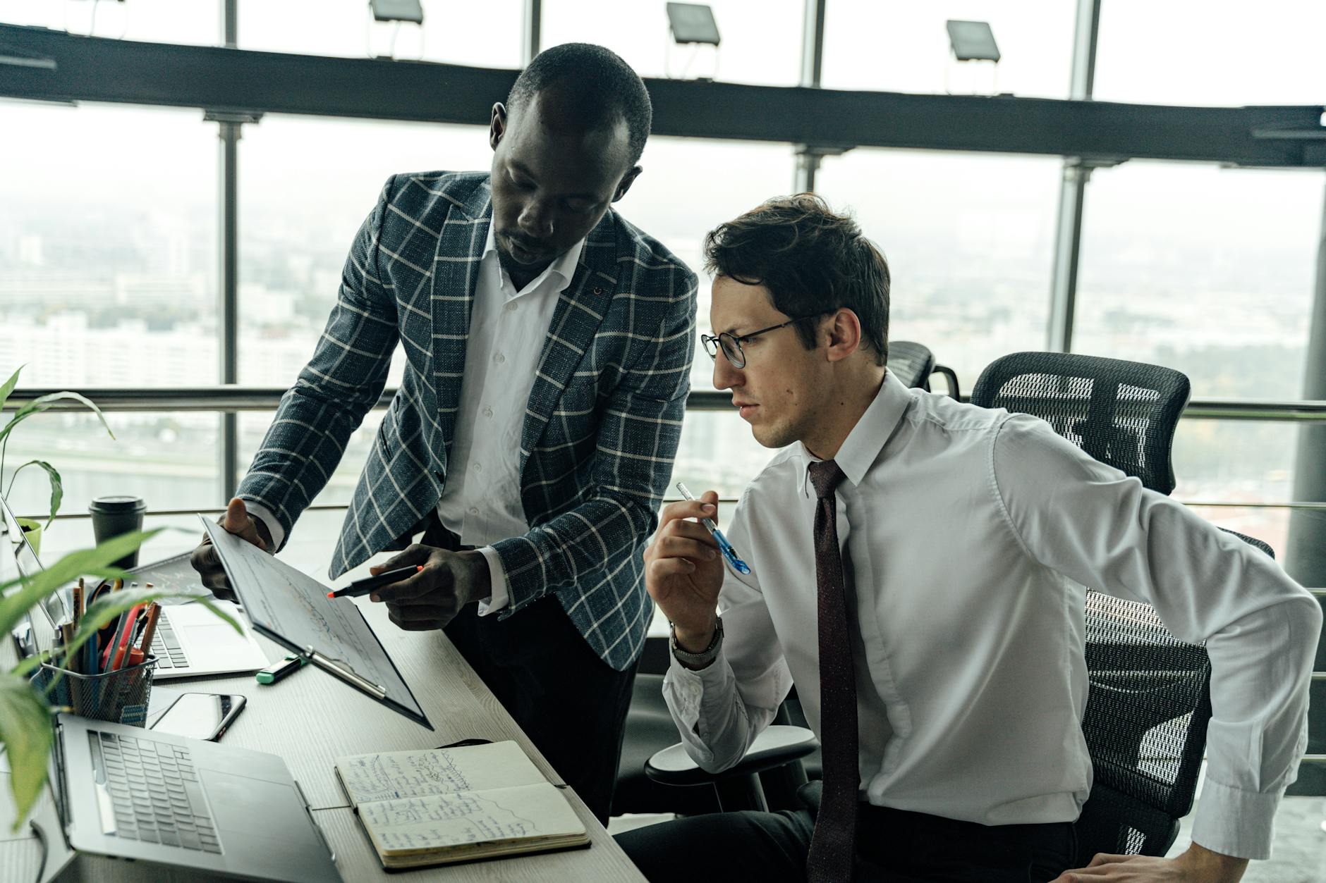 two men working together